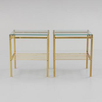 A pair of brass and glass tables, second half of the 20th century.