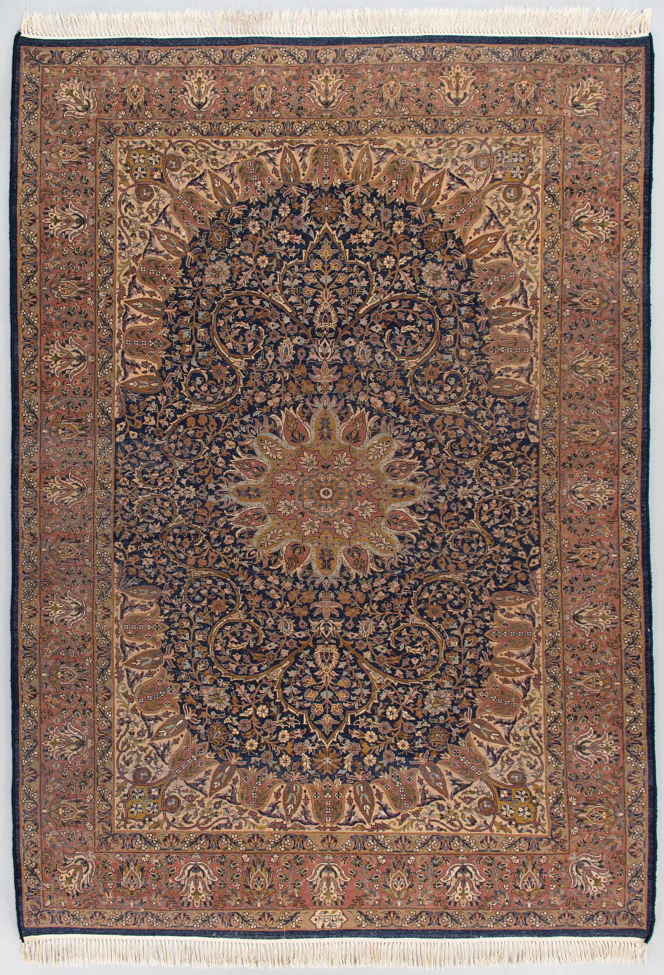 A signed rug, oriental, ca. 242 x 168 cm.