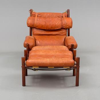 A 1960/70's 'Inca' easy chair and a foot stool by Arne Norell.