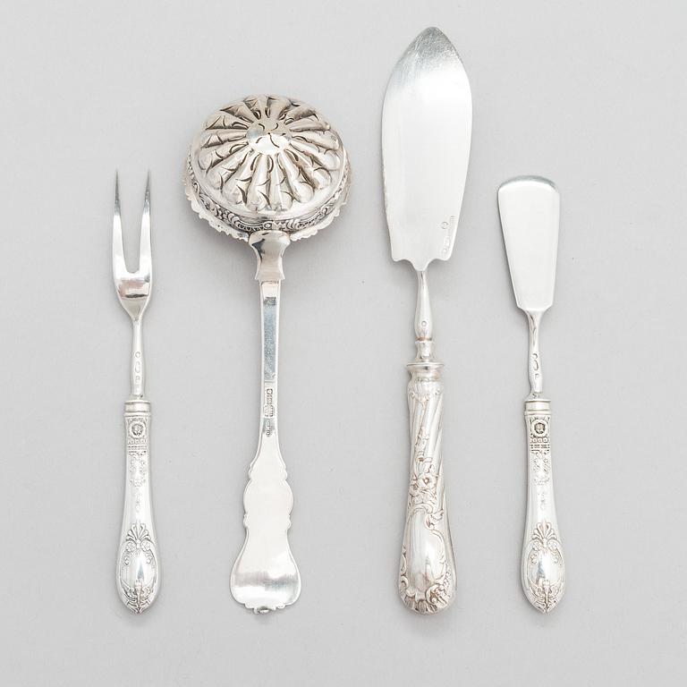 Four pieces of Russian silver cutlery.