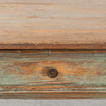 A 19th Century table with a drawer.