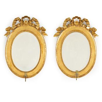 A pair of Gustavian style mirror scones, late 19th century.