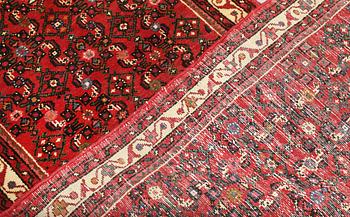 A Hosseinabad runner, c. 381 x 81 cm.