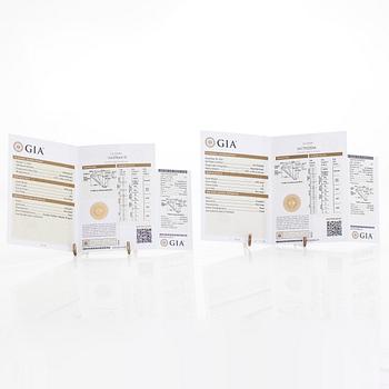 Korvakorut, 18K valkokultaa, ja briljanttihiottuja timantteja. Mukana GIA-raportti.