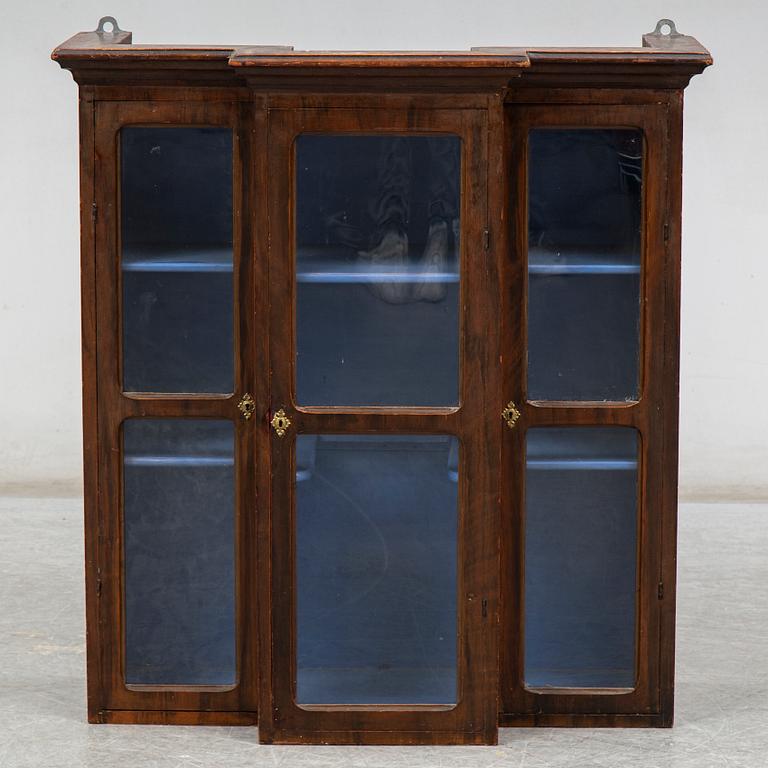 A late 19th century painted wall cabinet.