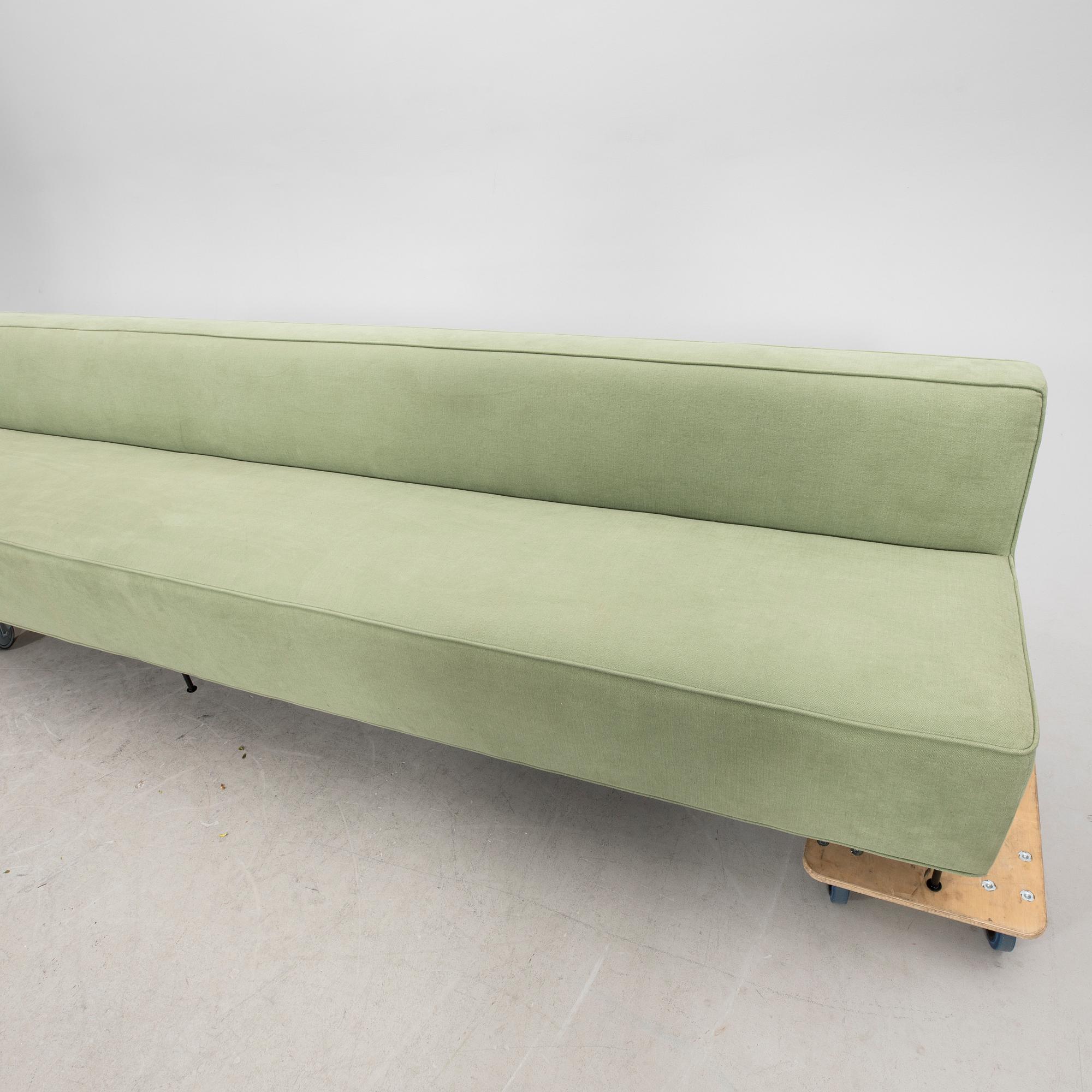 A sofa Modern Line' by Greta Magnusson Grossman, produced by Gubi, contemporary.