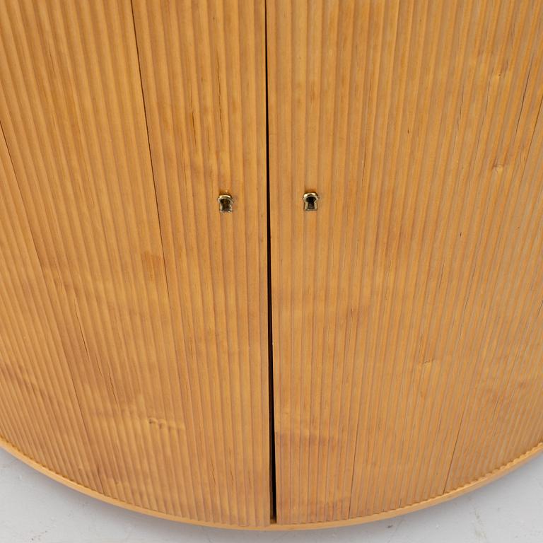 Corner cabinet, circa the mid-20th century.