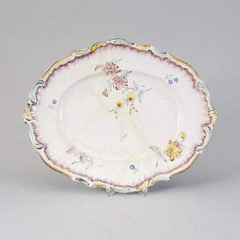 A Rörstrand faience ware, painted in 1771.