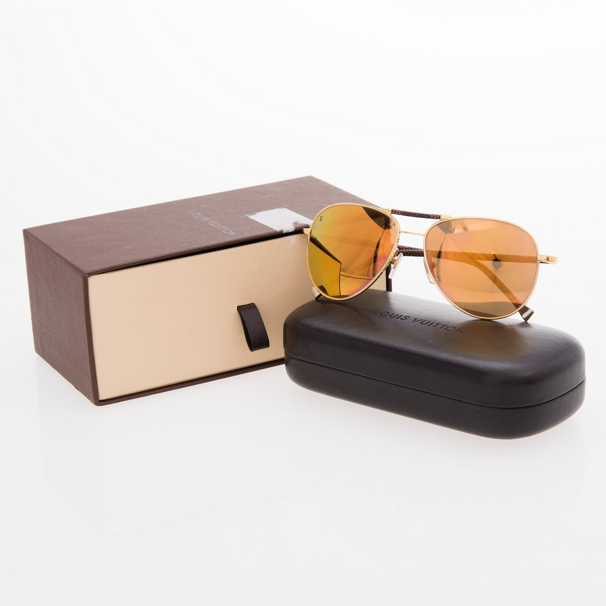 LOUIS VUITTON, A Pair of Conspiration Pilote Sunglasses.