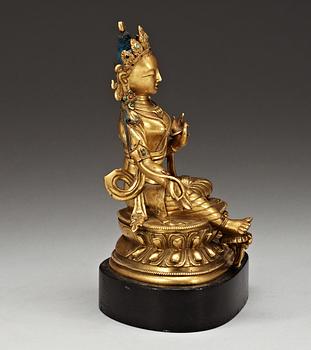 A gilt bronze figure of Green Tara, Sino-Tibetan, 18th Century.