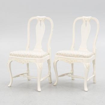 A Rococo style dining table with eight chairs, second half of the 20th century.