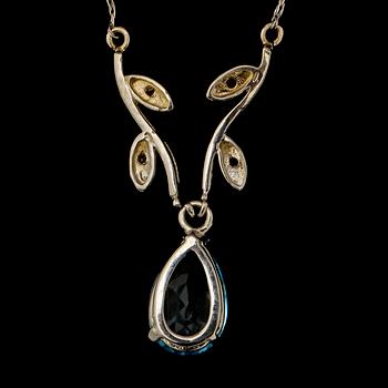 COLLIER, 14k vitguld med fasettslipad topas samt 4 små fasettslipade diamanter, 2000-tal. Vikt 2 g.