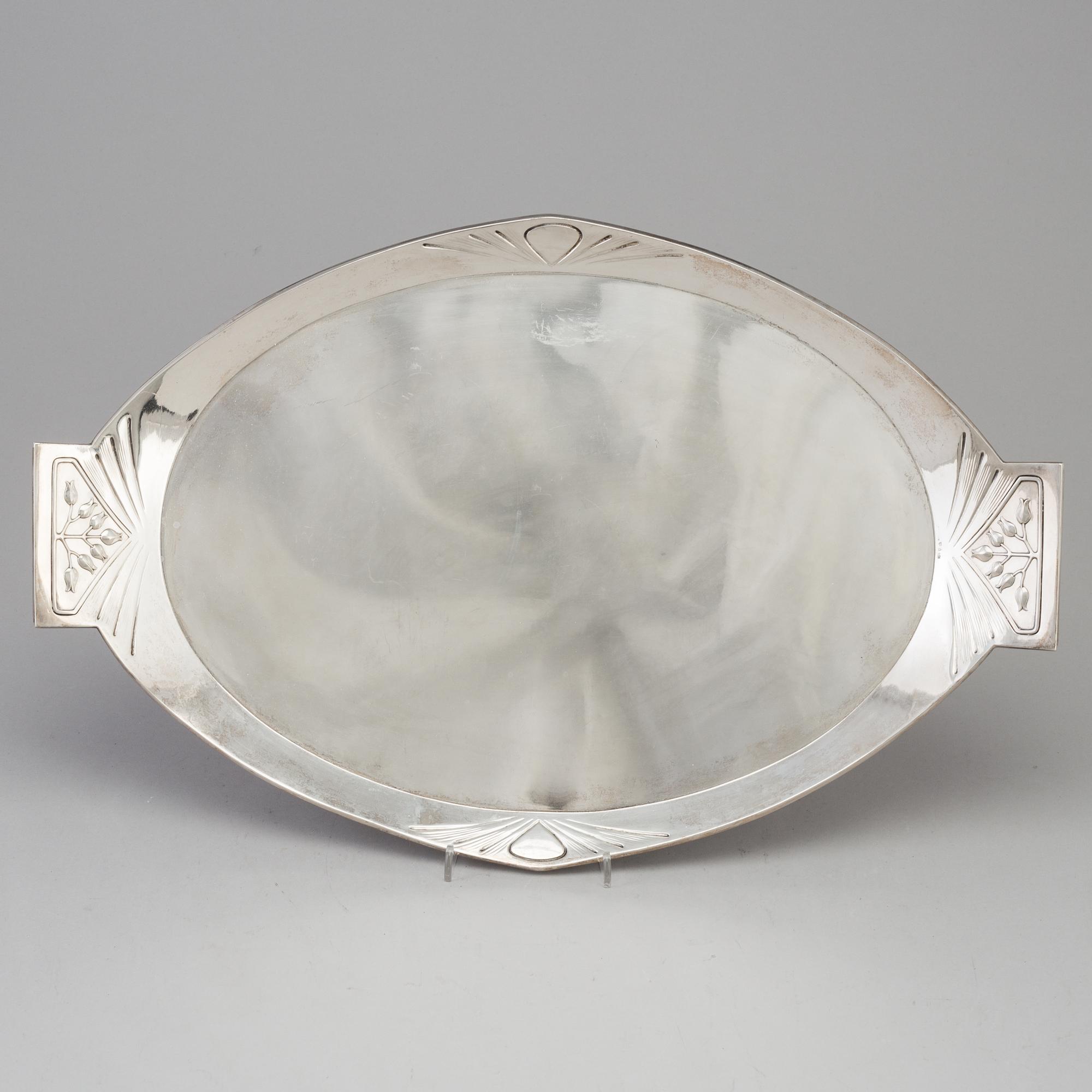 A Swedish Art Nouveau silver tray decorated with stylized sprays of flowers, maker's mark CF Carlman, Stockholm, 1904.