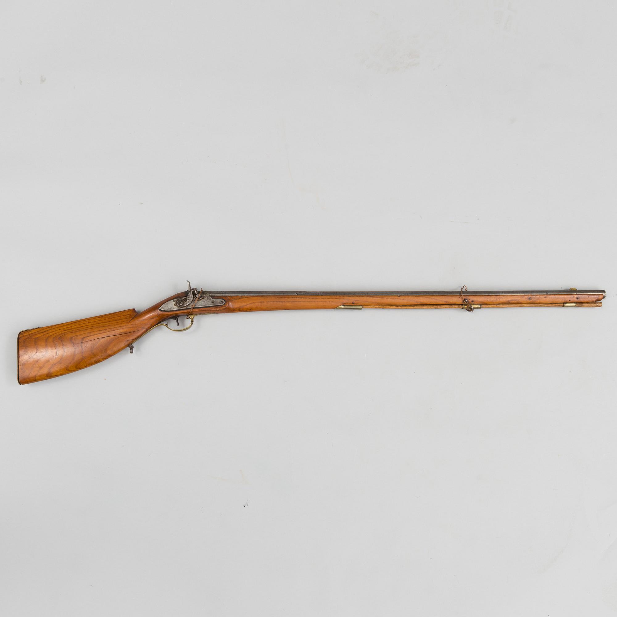 An 18th century percussion gun.