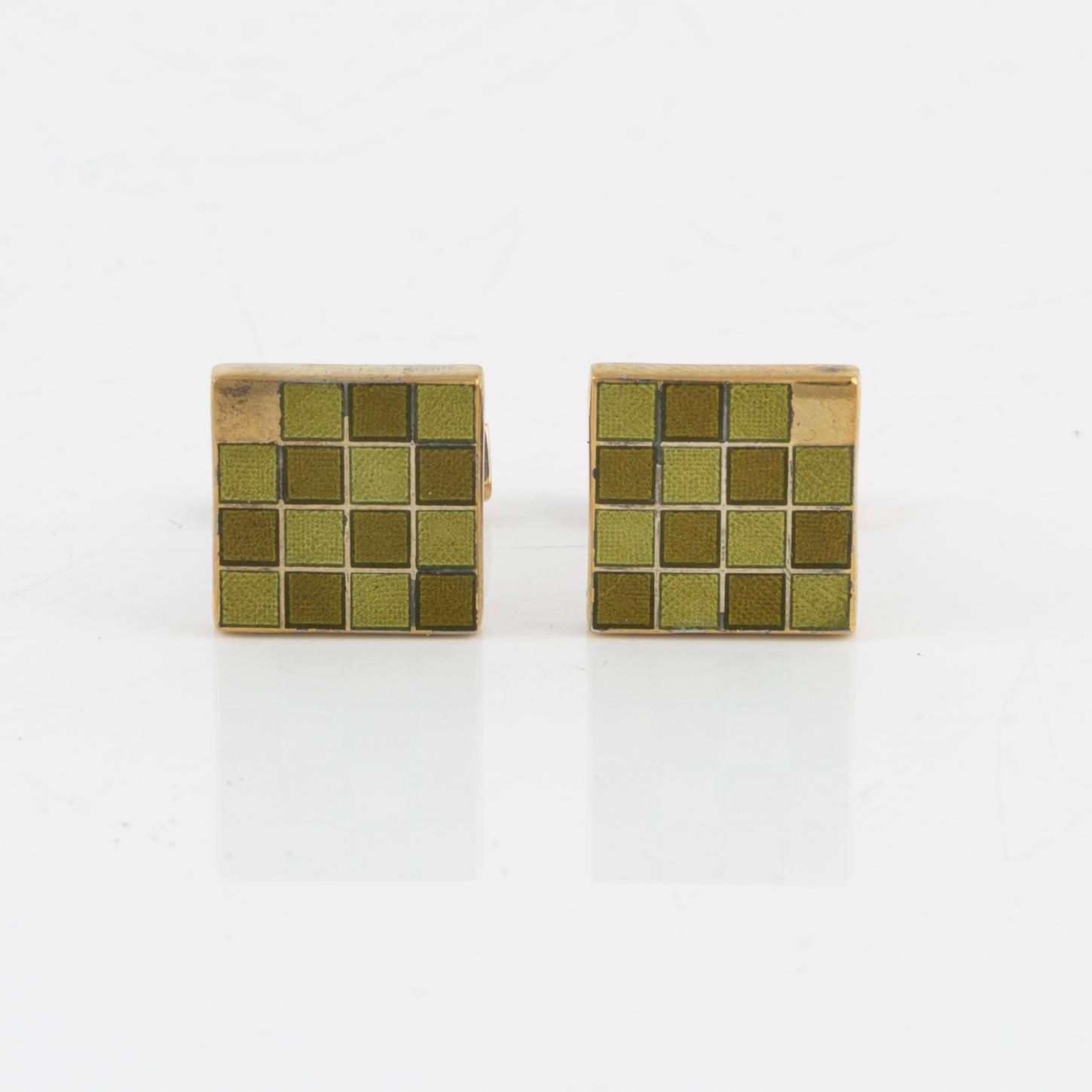 Louis Vuitton, a pair of gold plated silver cufflinks.