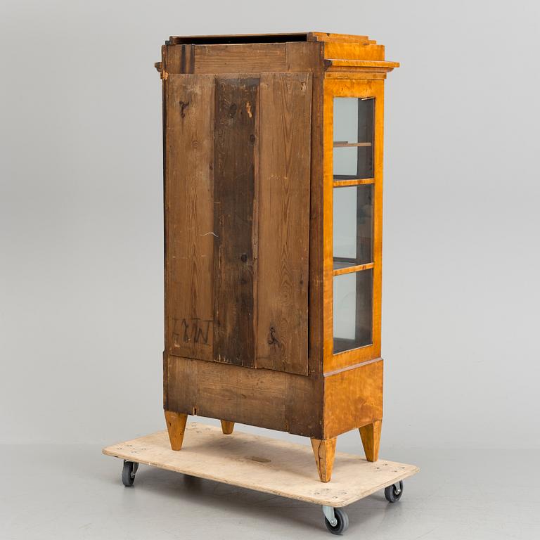 A Swedish first half of the 19th century display cabinet veneered with birch.