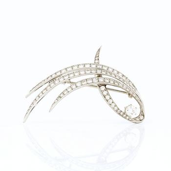 BROSCH, 18K vitguld med briljanter diamanter, tot ca 0,99 ct. Vikt ca 8,30 g.