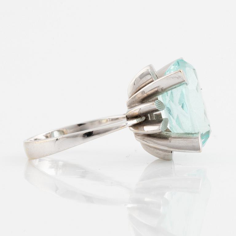 White gold and aquamarine ring.