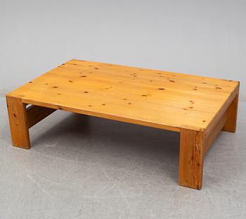 A 1960s pine coffee table.