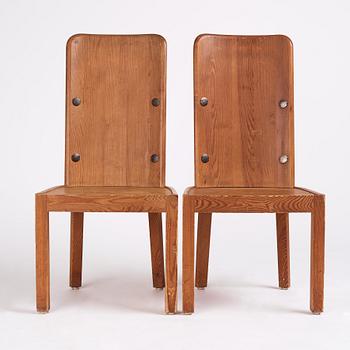 Axel Einar Hjorth, a pair of stained pine 'Lovö' chairs, Nordiska Kompaniet, Sweden 1930s.