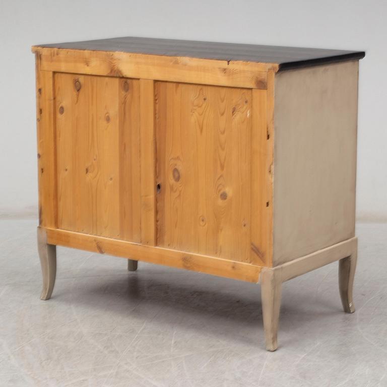 An early 20th century painted chest of drawers.
