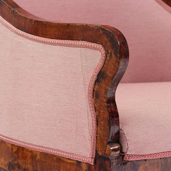 A pair of Baltic mahogany fauteuils, mid 19th century.