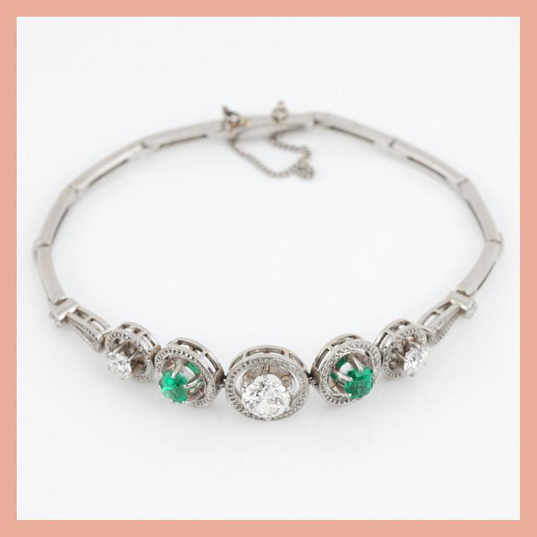 An emerald and old-cut diamond bracelet. Total carat weight of diamonds circa 1.50 cts.