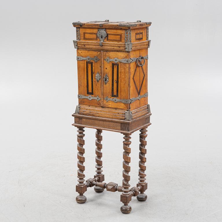 A Baroque style cabinet, late 19th Century.
