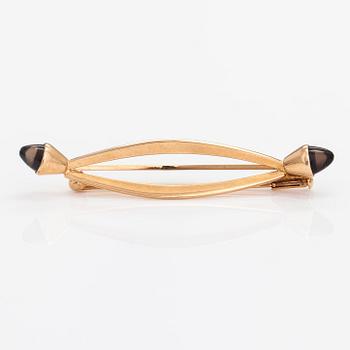 Elis Kauppi, A 14K gold brooch with smoky quartzes. Kupittaan kulta, Turku 1961.