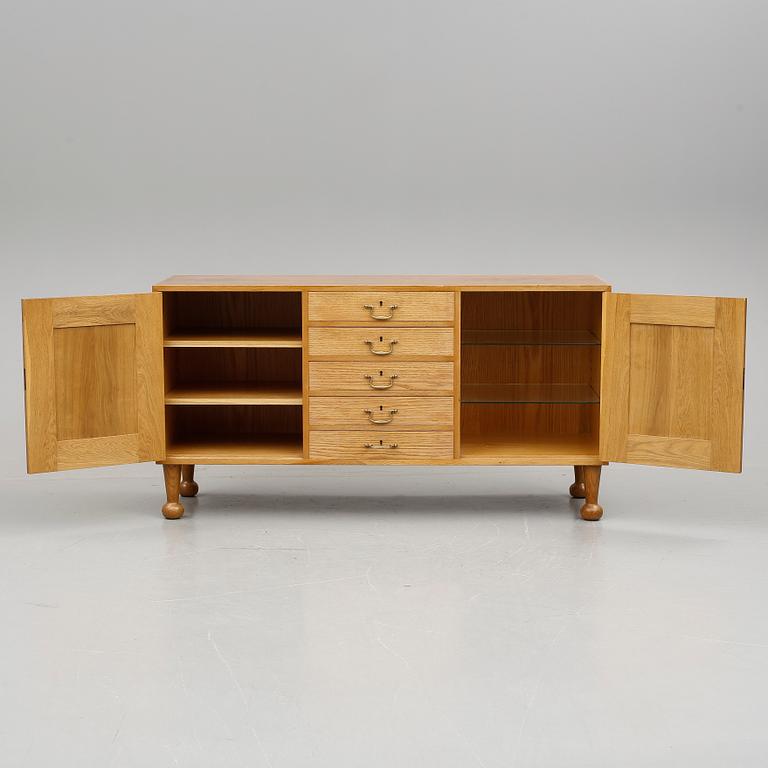 Josef Frank, an elm and mahogany sideboard, Svenskt Tenn, model 727, probably 1960's.