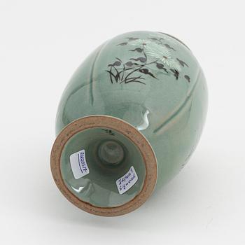 A Japanese celadon glazed vase, signed, 20th Century.