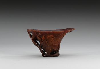 A rhinoceros horn libation cup, Qing dynasty, Kangxi (1662-1722).