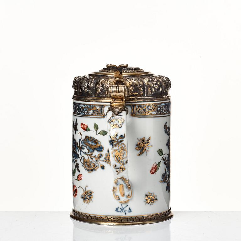 A Silvermounted Meissen tankard, 1740's. Silver makers mark, Nürnberg, Joh. Nic. Wollenberg (1759-1789).