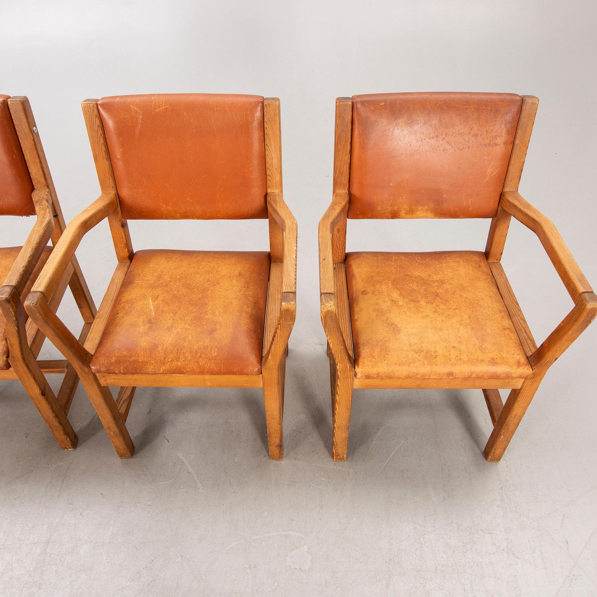 A set of four 1970:s Tage Poulsen Daumiller oak and leather armchairs for GM Möbler Denmark.