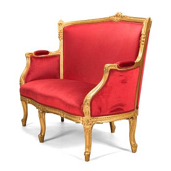 A late 19th century sofa in Louis XVI style.