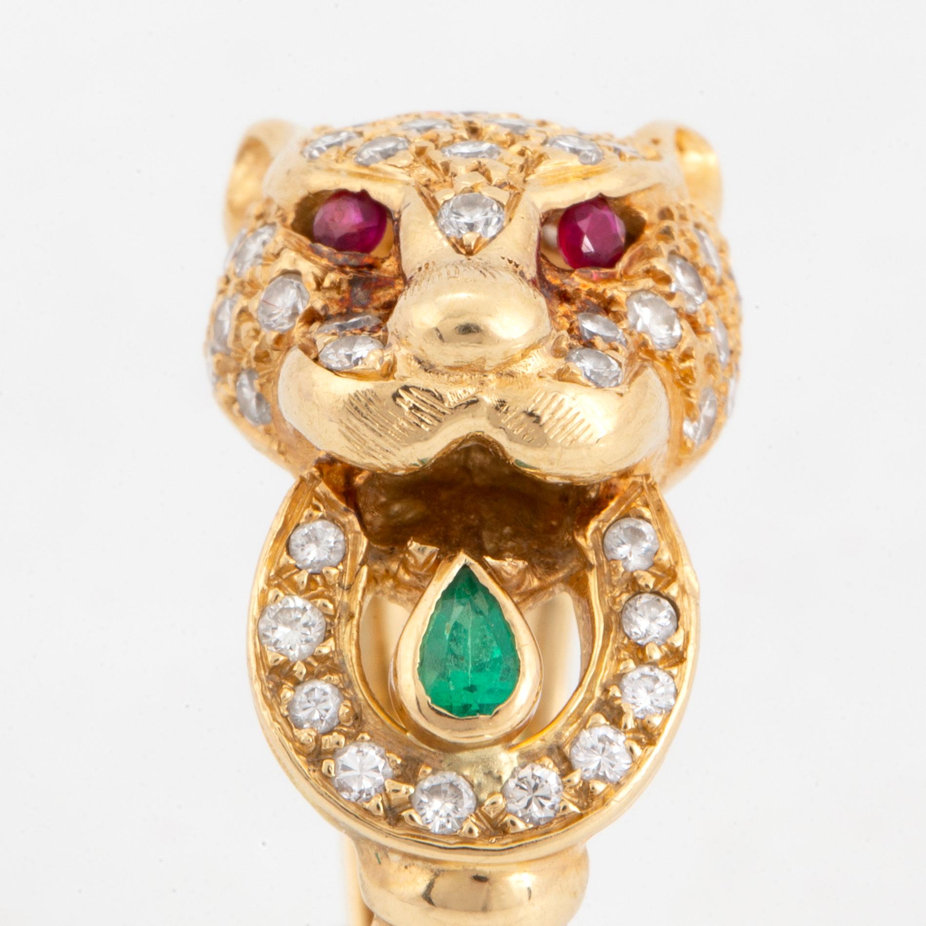 18K gold brilliant cut diamond ruby and emerald tiger ring. Bukowskis