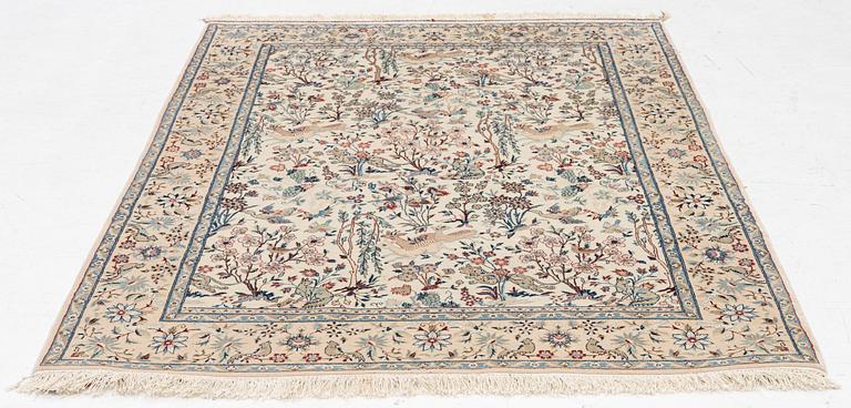 A Nain rug, part silk, figural, c. 165 x 110 cm.