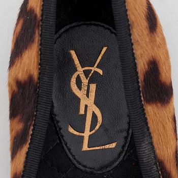 YVES SAINT LAURENT, a pair of leopard haired leather ballet flats.