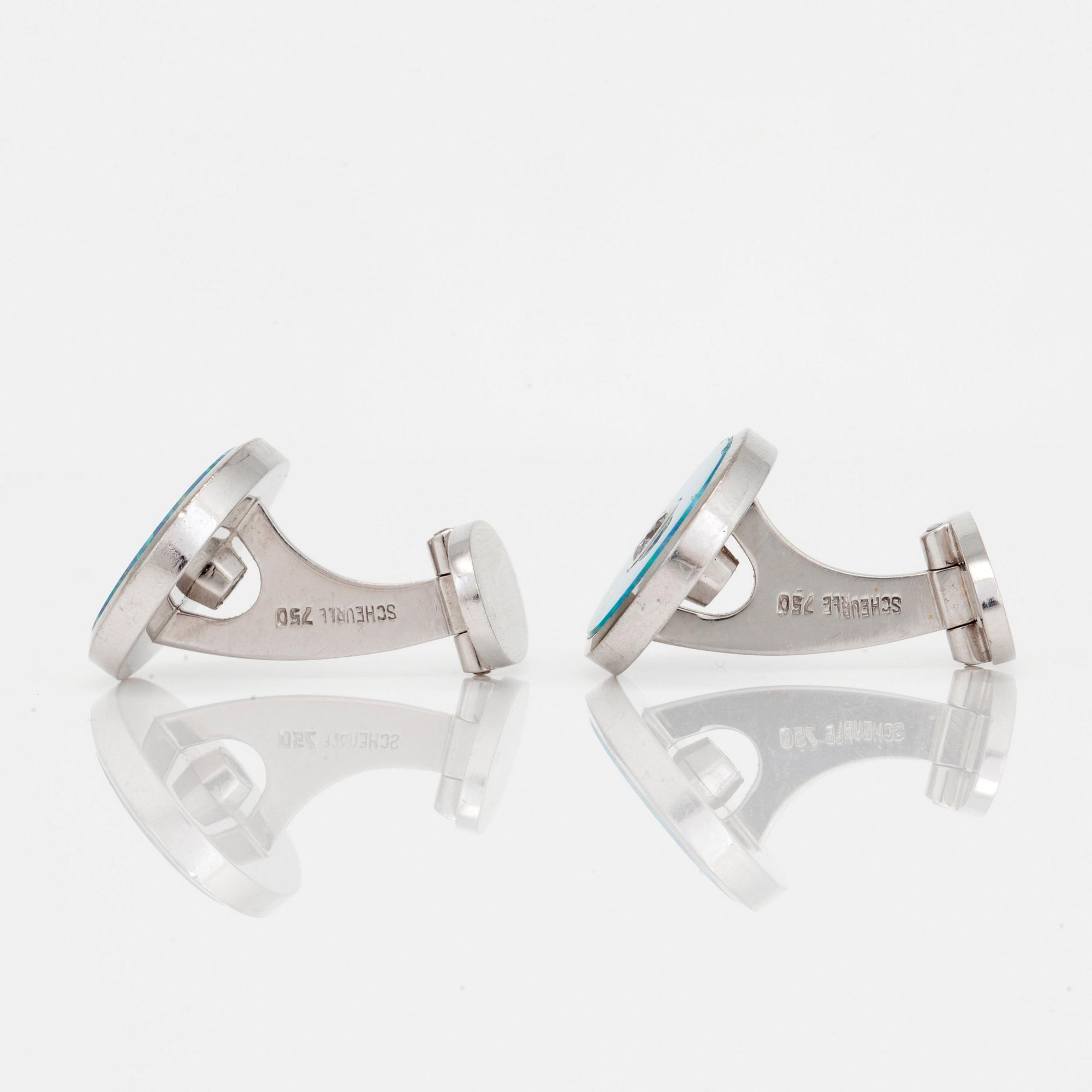 A pair of Quinn Scheurle opal and diamond cufflinks.