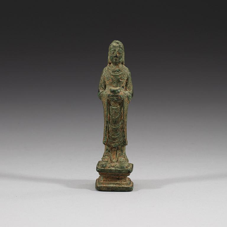 A standing bronze Buddha, presumably Tang/Liao dynasty (618-1125).