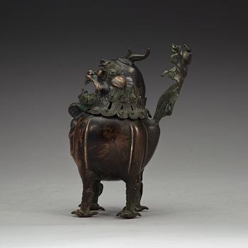 A bronze censer in the shape of a buddhist lion, Qing dynasty (1644-1912).
