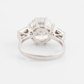 A 14K white gold ring set with a round brilliant-cut diamond weight ca 5.25 cts quality ca F/G vvs.