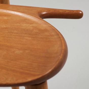 A Hans J Wegner 'Jakkens Hvile' teak chair, Johannes Hansen, Denmark.