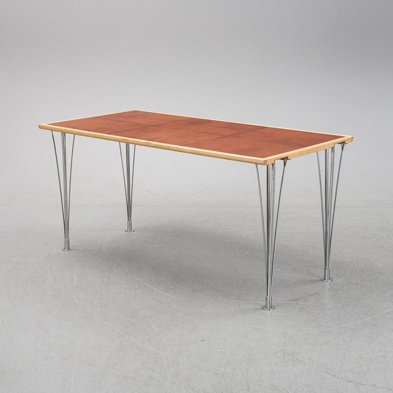 A birch and leather dining table produced by Mathsson International, 21th century.