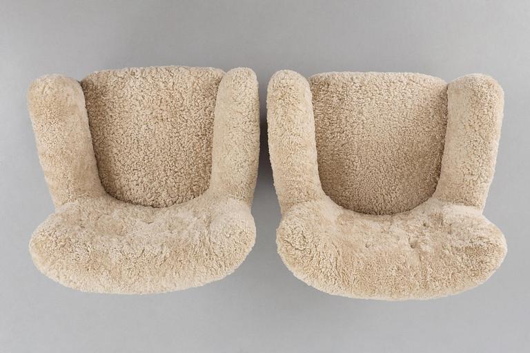 Fritz Hansen, a pair of easy chairs model "1669", Denmark, 1940s.