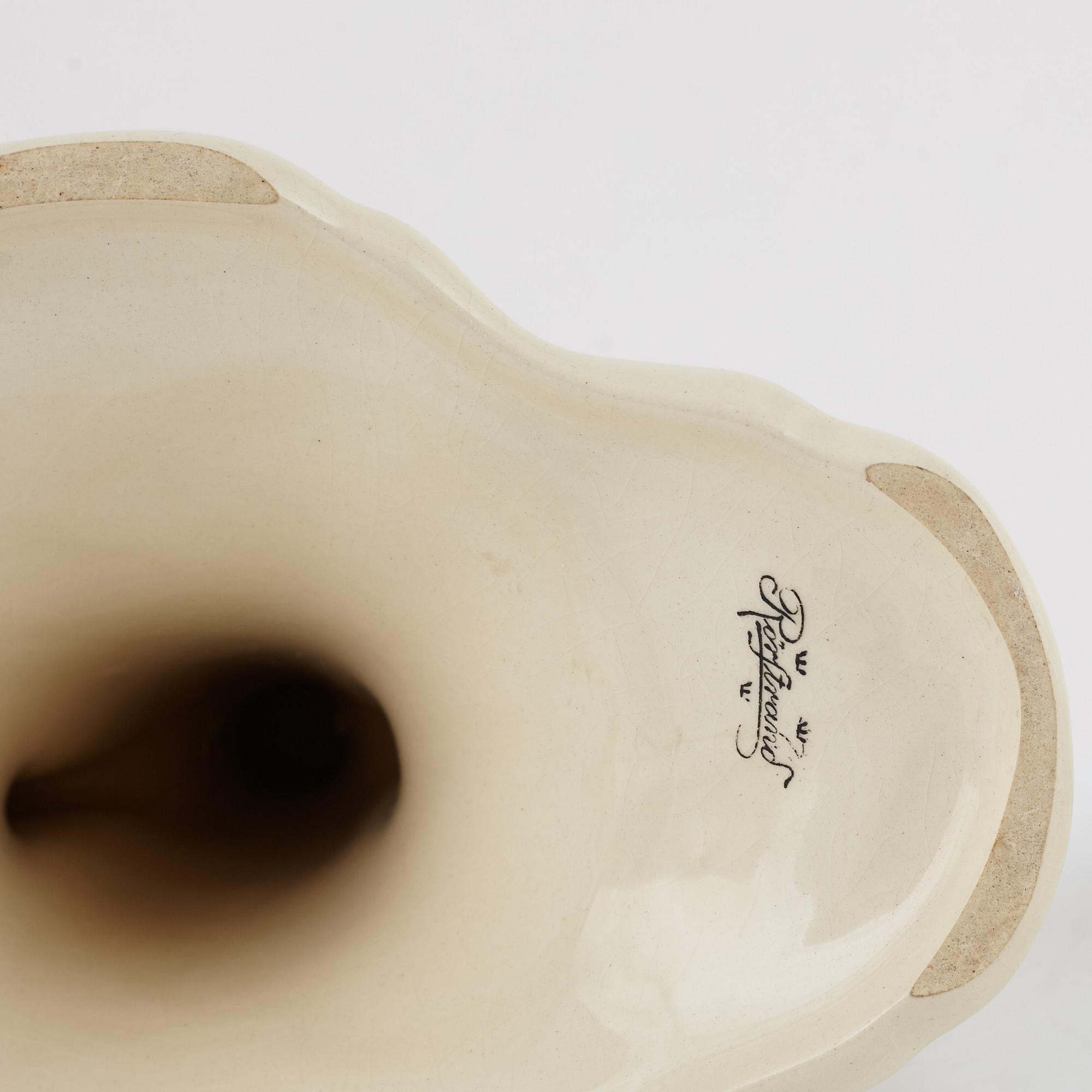 A pair of 'Daladansen' creamware candelabra from Rörstrand, Art Nouveau, early 20th Century.