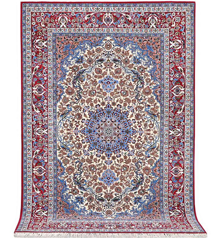 An Esfahan rug, part silk, c. 243 x 158 cm.