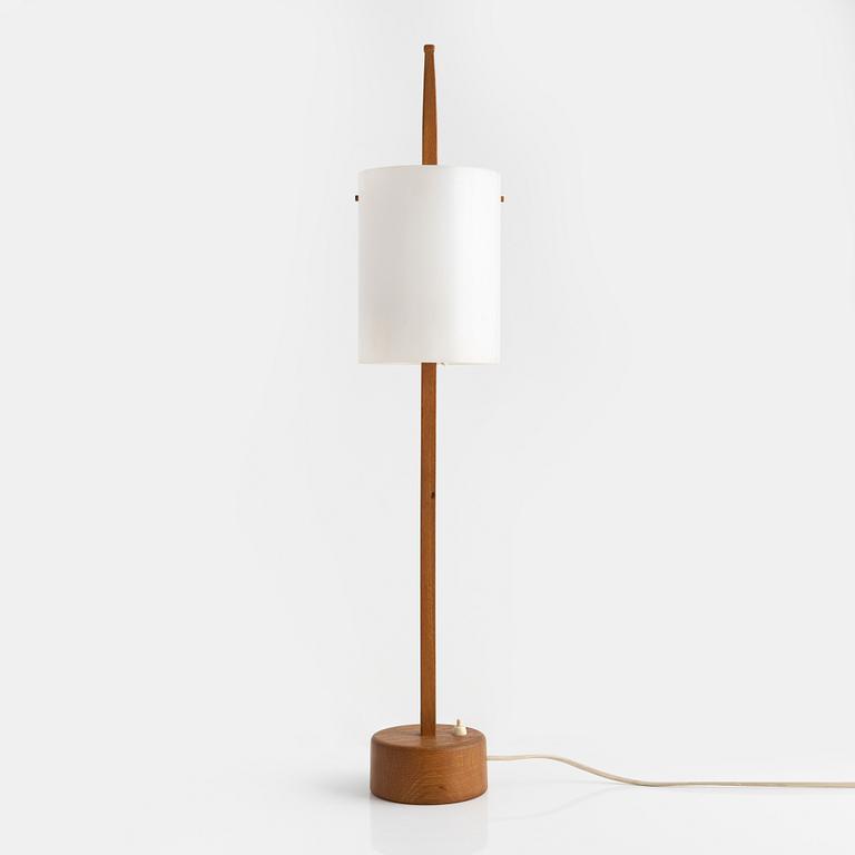 Uno & Östen Kristiansson, an oak and acrylic table lamp, Luxus, Vittsjö.