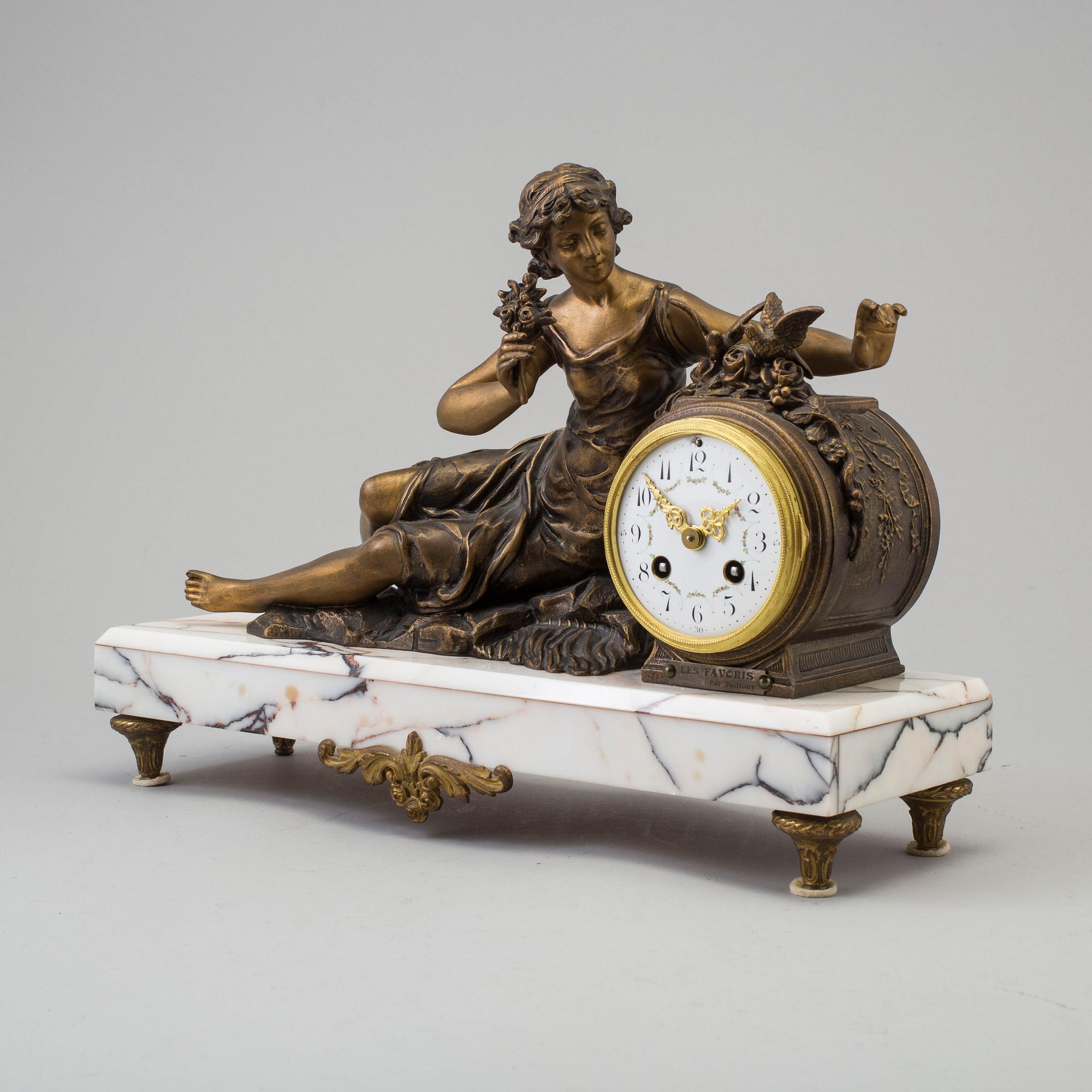 a circa 1900 mantle clock, marked Ruffony.