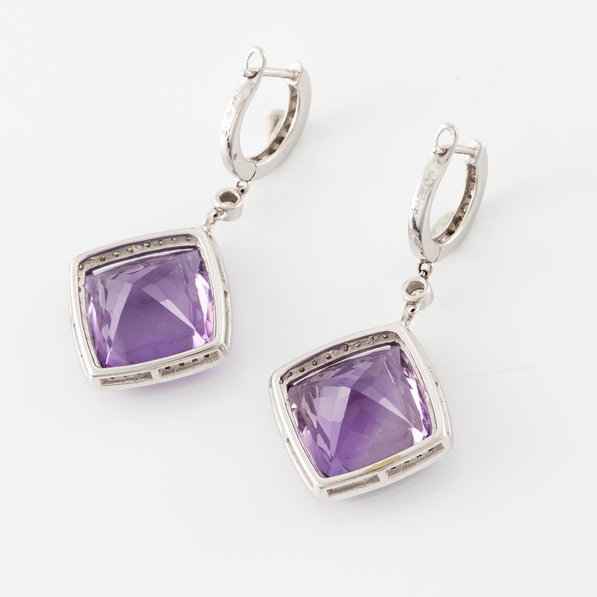 Earrings, a pair, 18K white gold with amethysts and brilliant-cut diamonds.